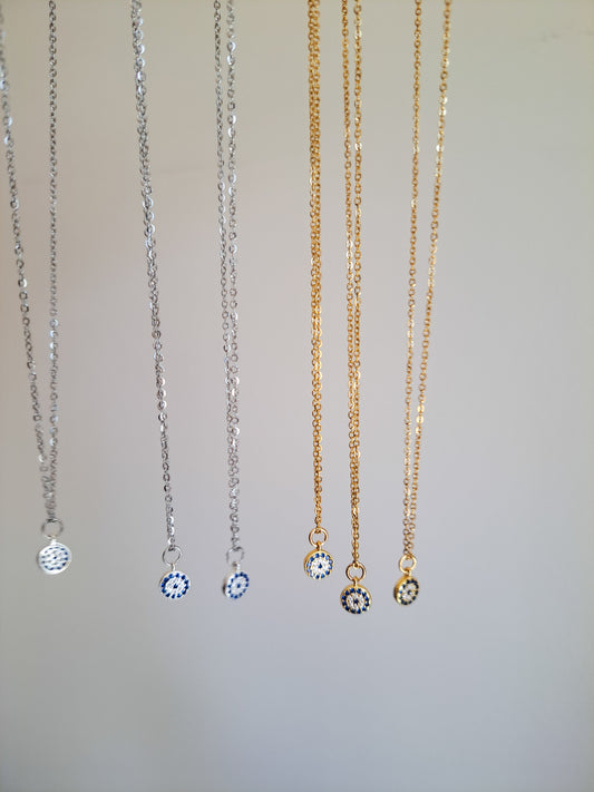 The Magic & Meaning Behind Evil Eye Necklaces: Protection, Style & Symbolism