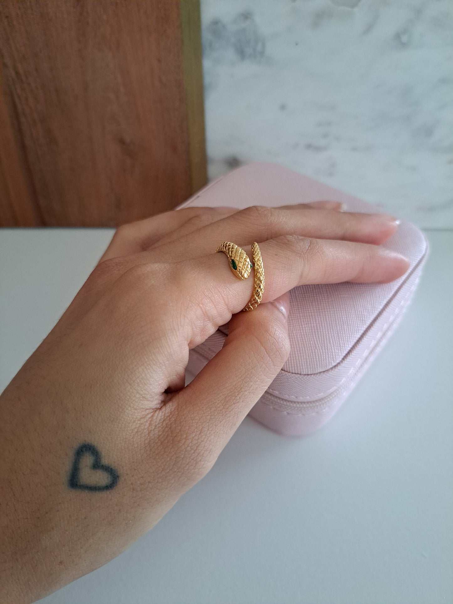 woman wearing a snake ring