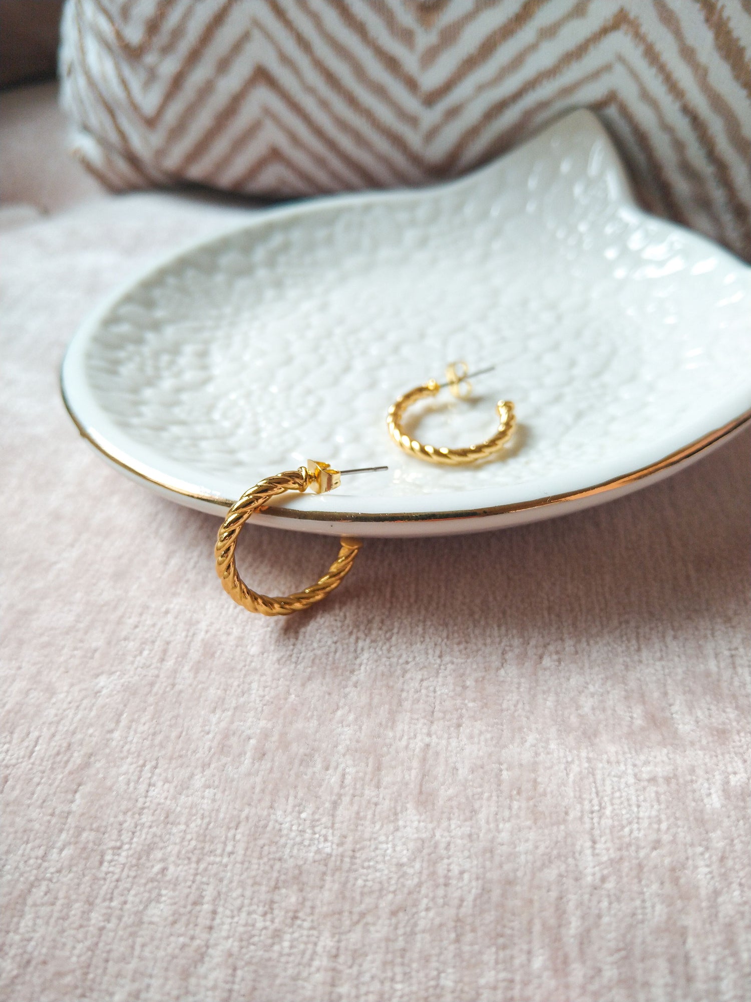 dainty earrings or classic hoop earrings, or stand out with bold statement earrings