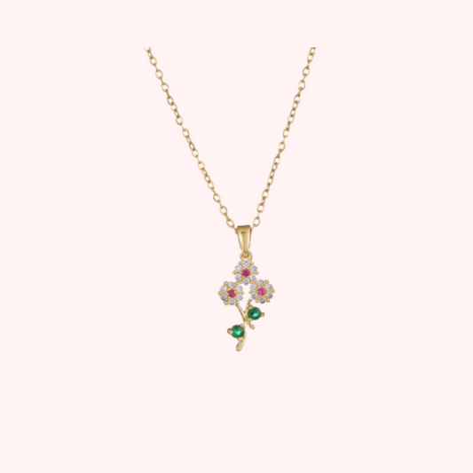 Diamond flower pendant necklace on fine gold chain

