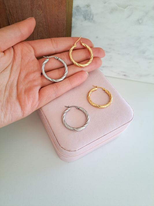 gold and silver hoops on a jewellery box 