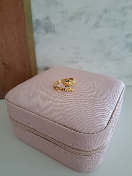 snake ring with emerald green diamonds for eyes 